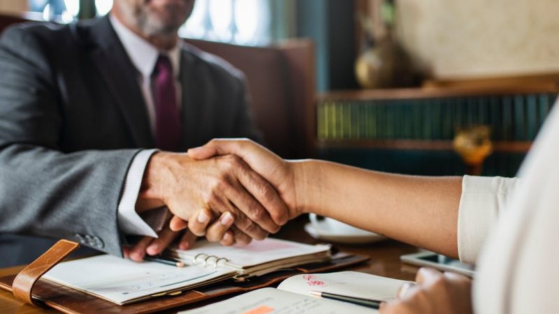 lawyer-client shaking hands